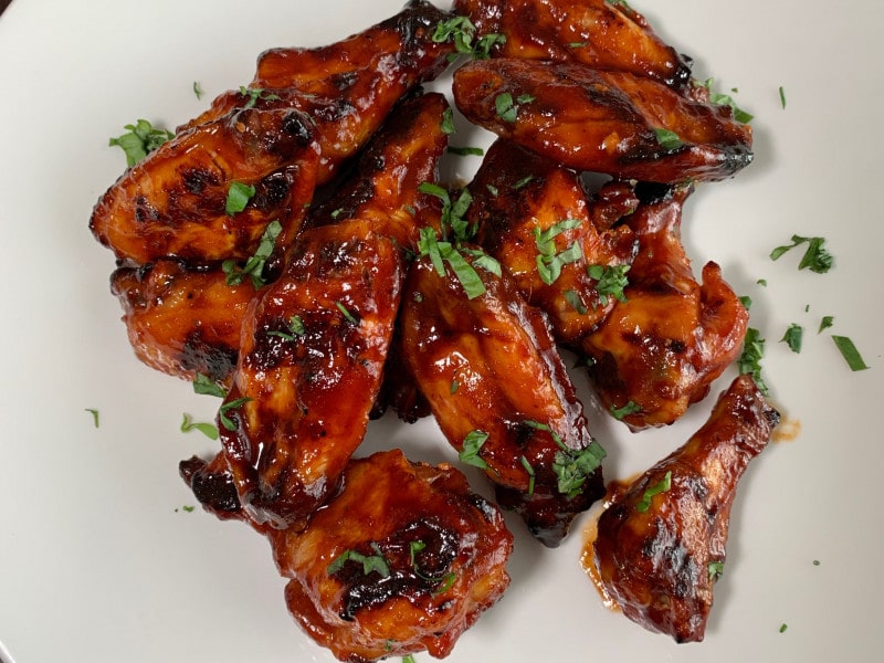 platter of sweet red devil wings