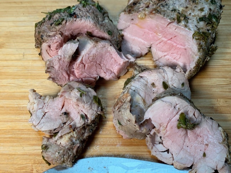 herb marinated pork tenderloin sliced