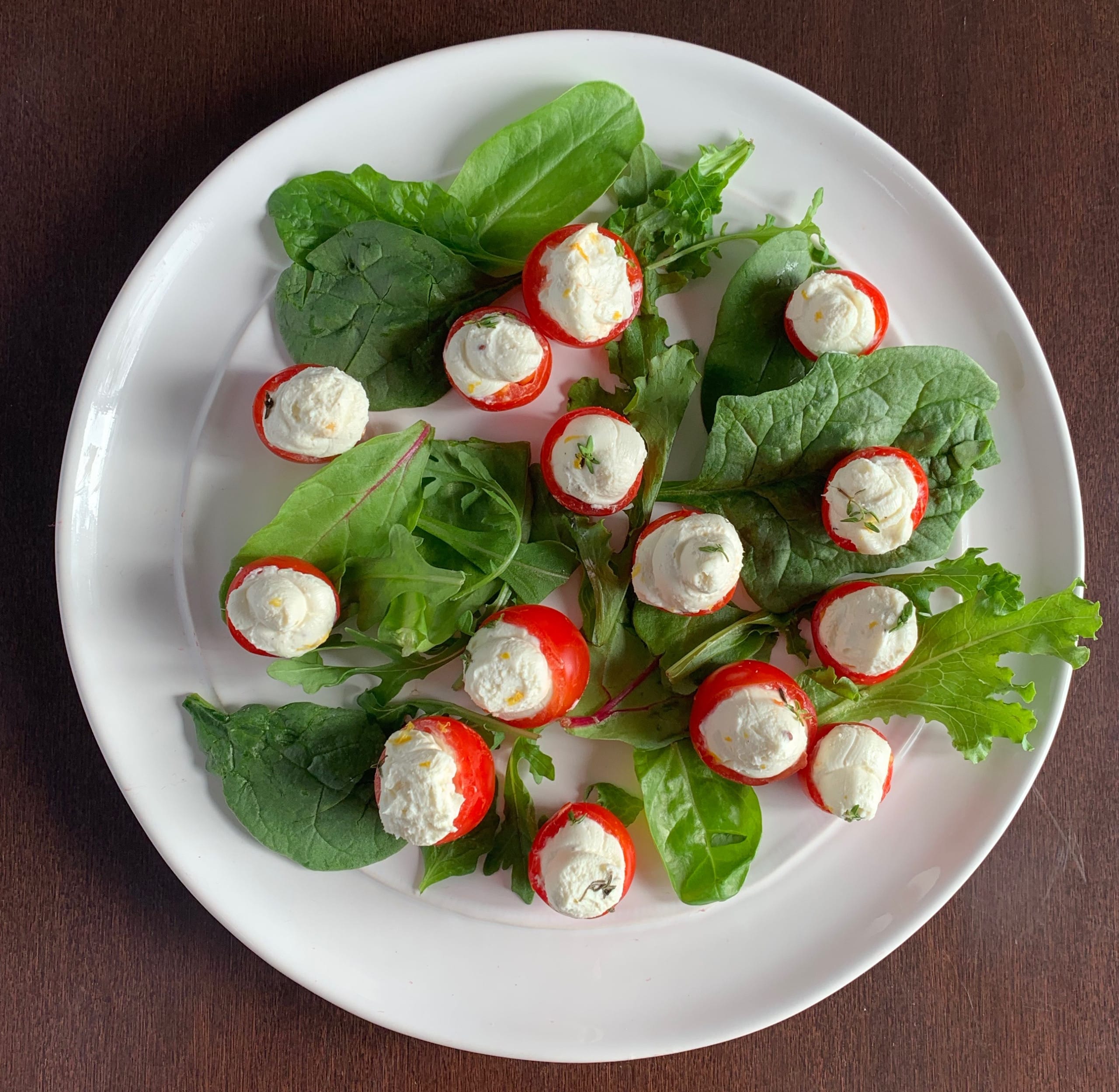 platter of goat cheese stuffed tomatoes