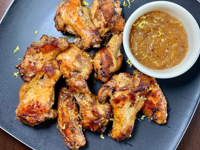 plate of moroccan wings with apricot glaze