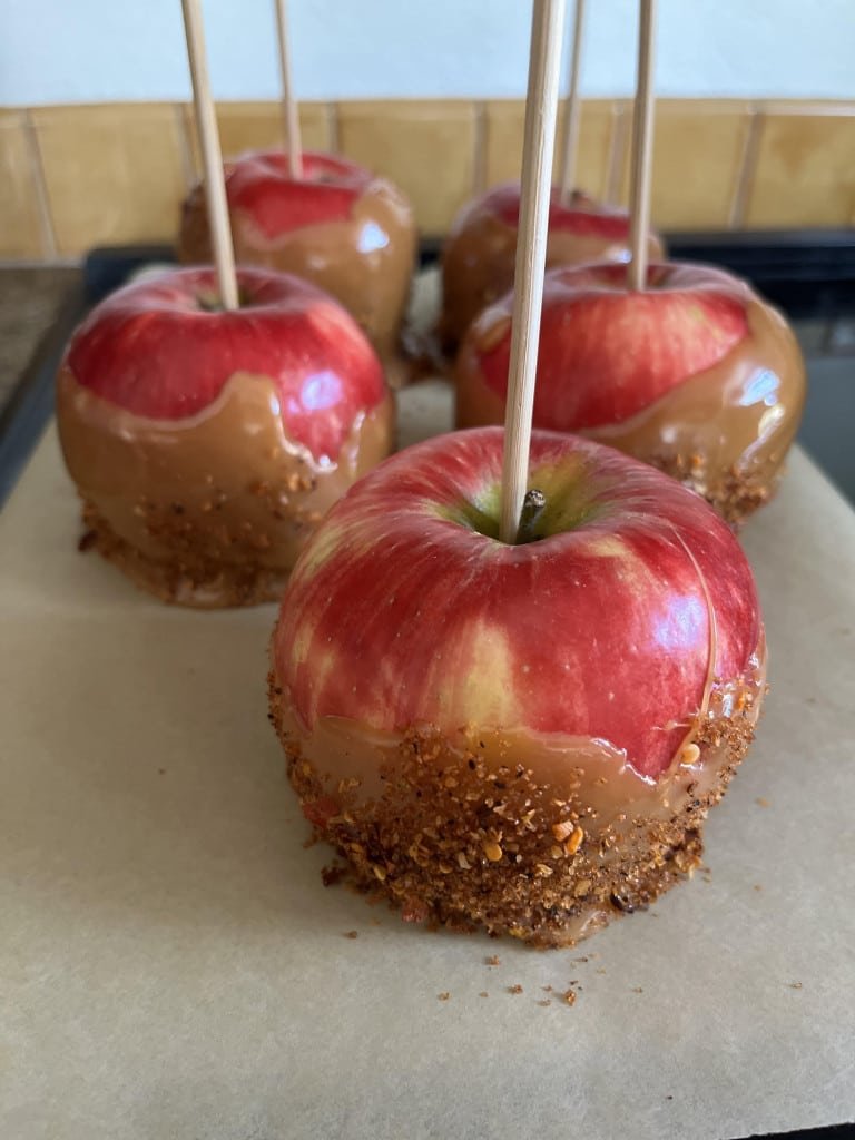 sheet pan of caramel apples