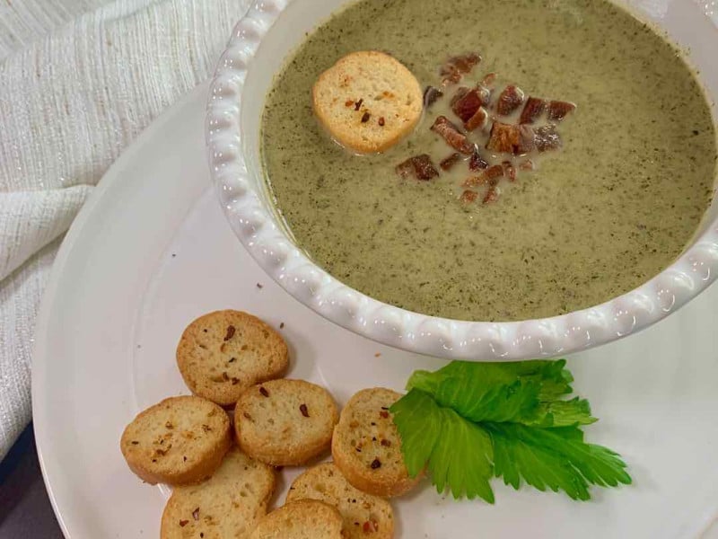 bowl of broccoli soup with croutons