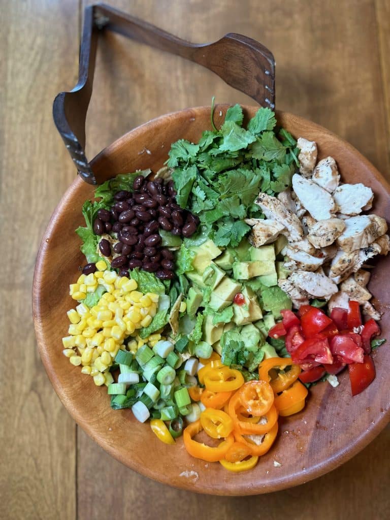 chicken taco salad ready to toss